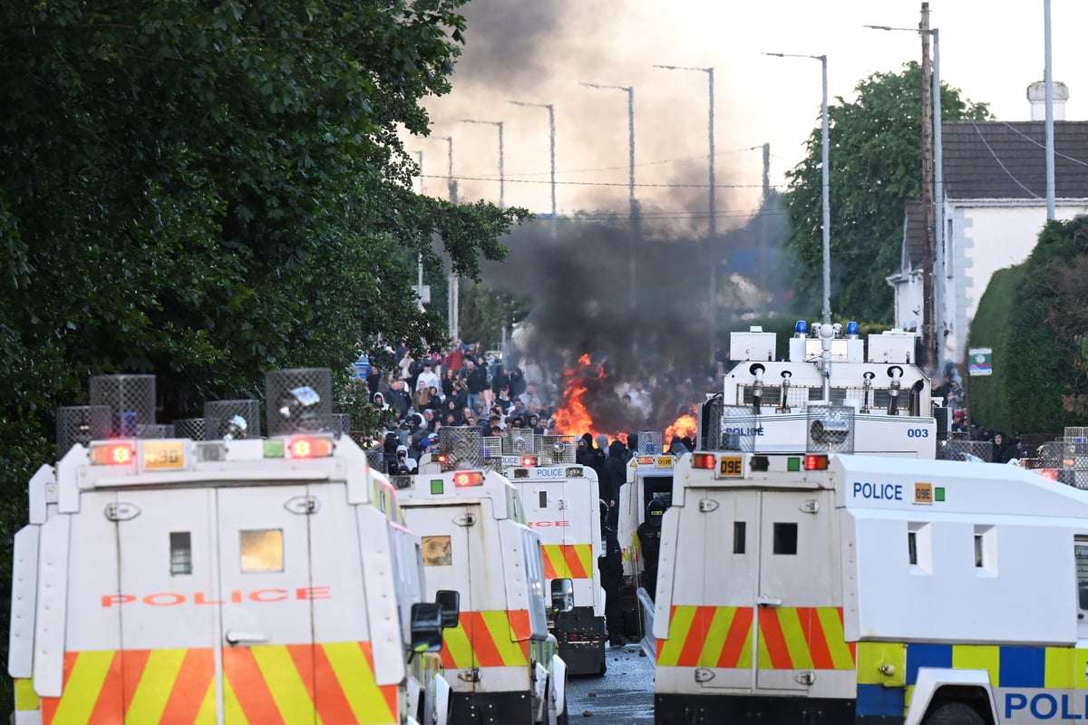  Riot police fire water cannon at protesters as second night of Belfast disorder erupts 
