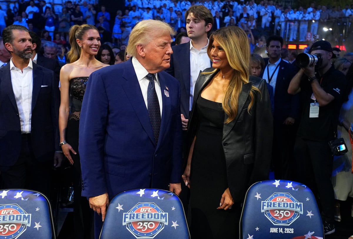 Barron Trump towers above parents Donald and Melania as 20-year-old takes in White House UFC cage fight