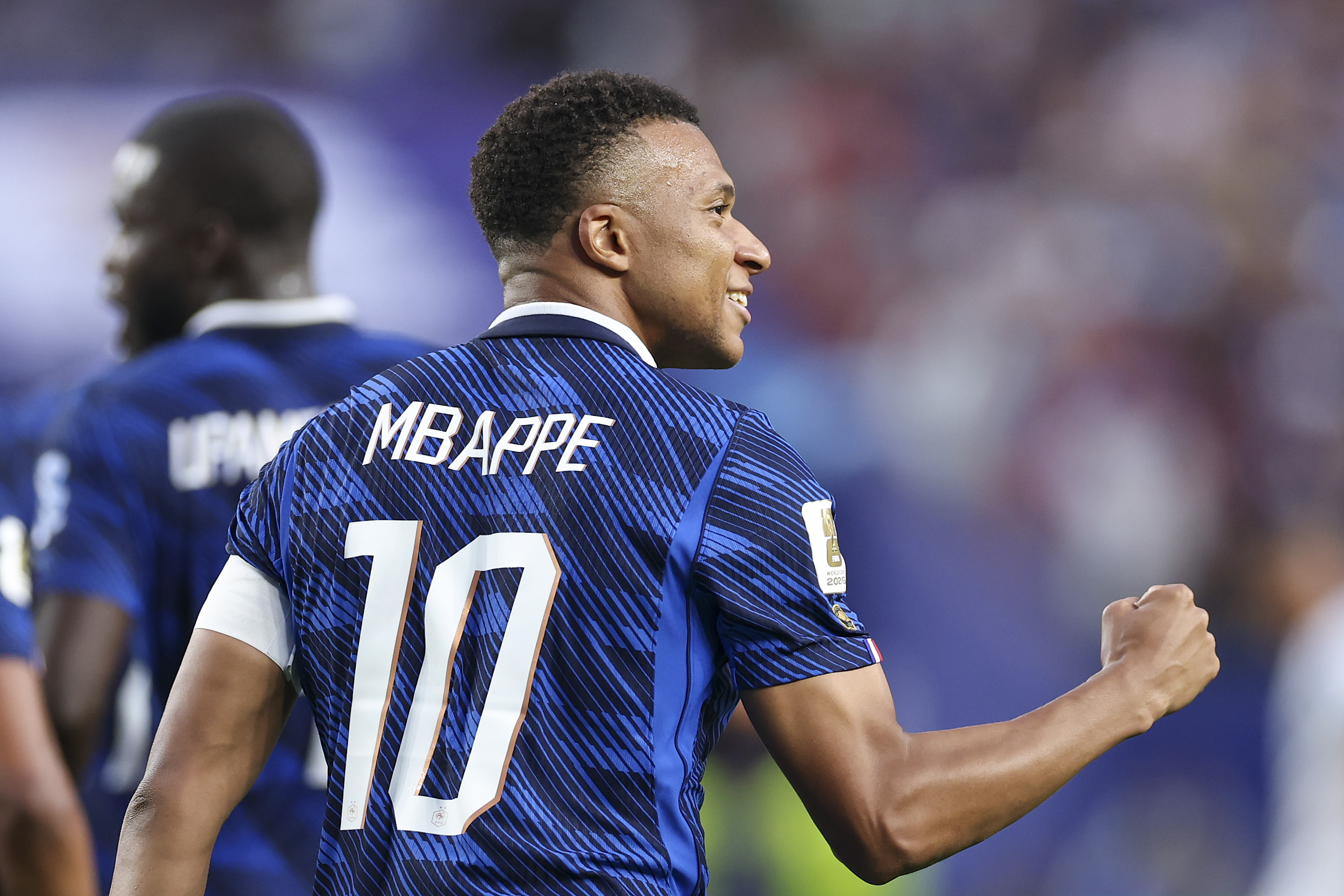 Mbappe shines as France defy two-hour weather delay to dispatch Iraq