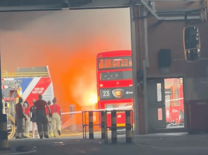 Moment London bus bursts into flames in Westbourne Park during record heatwave