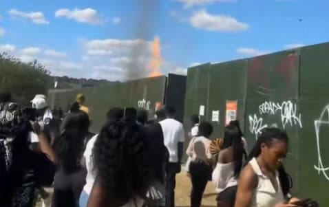 <p>Footage online appeared to show the fire at  the festival which caused the initial closure </p>