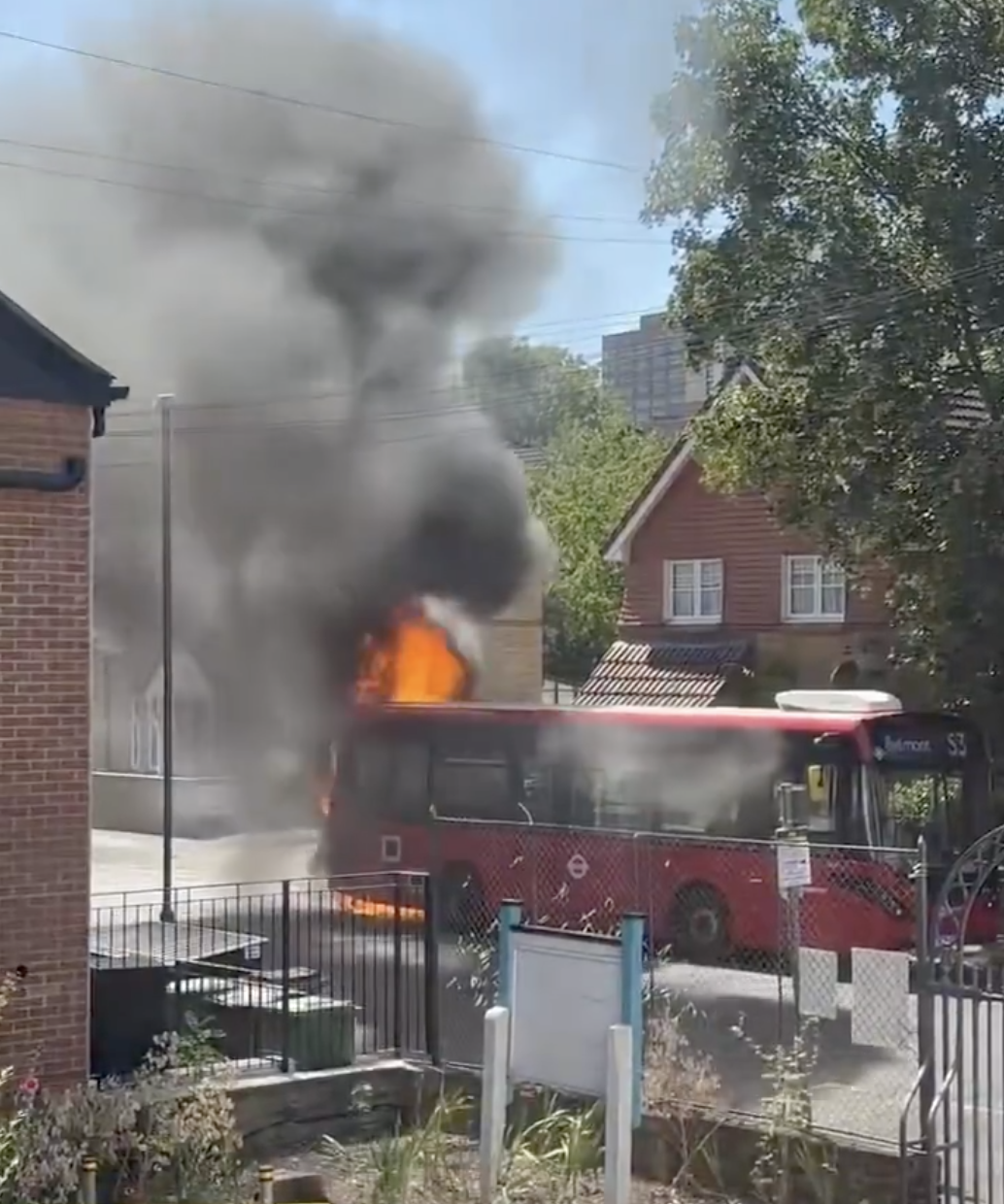 Moment bus bursts into flames on London street as firefighters rush to the scene