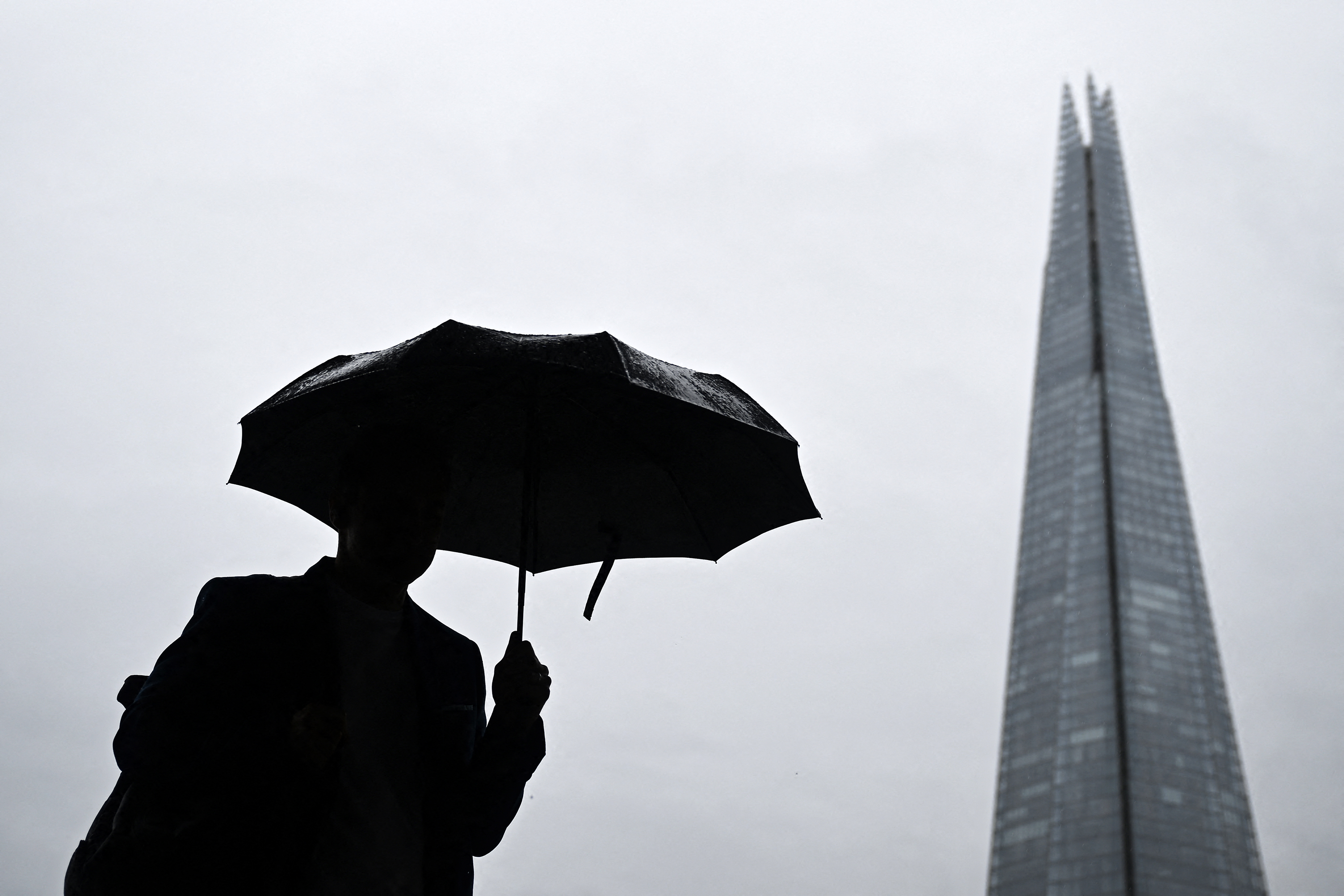 Heavy rain hits London as Sadiq Khan warns of risk of 'flash flooding'