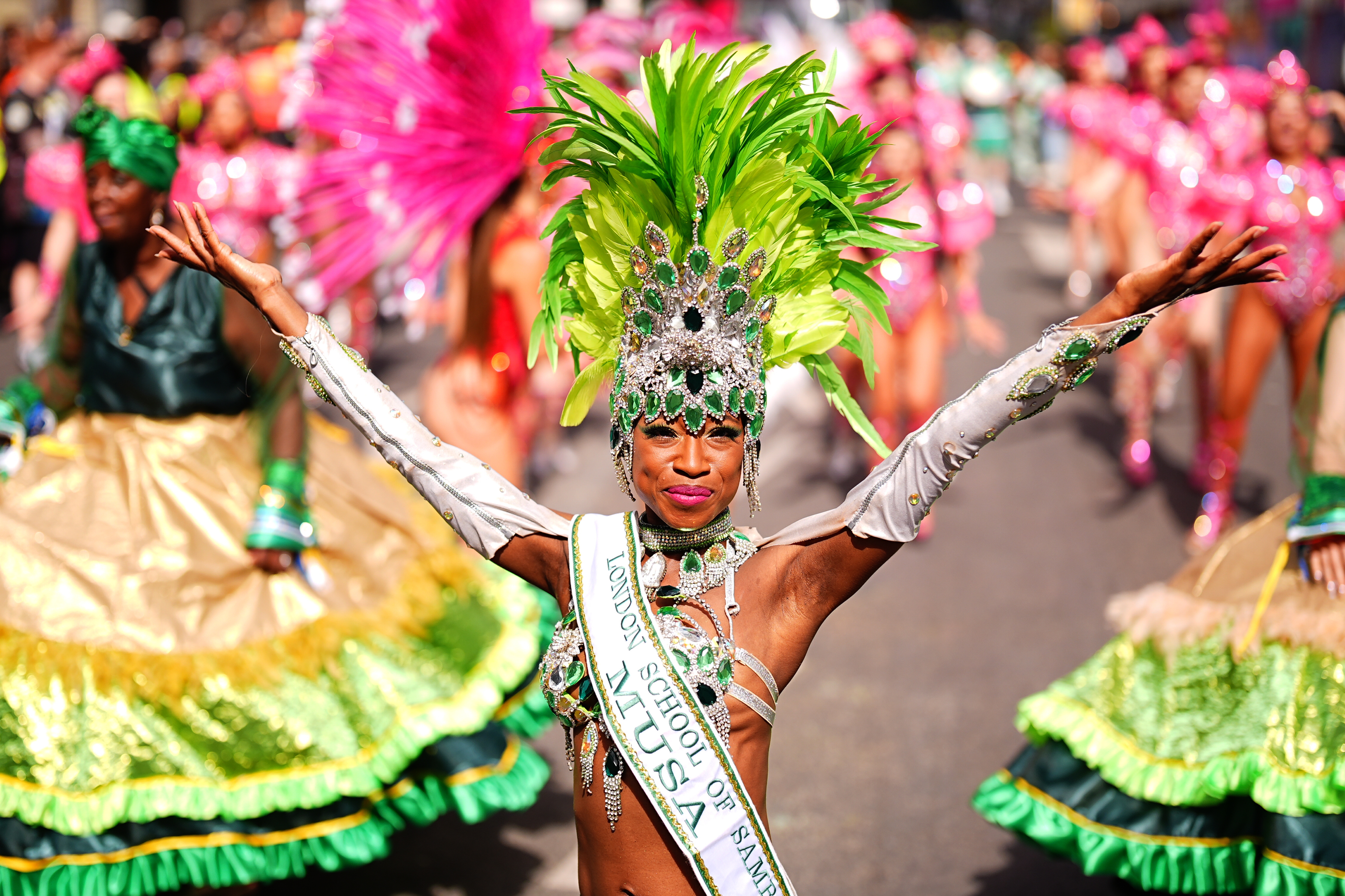 Notting Hill Carnival parade lights up west London as thousands party
