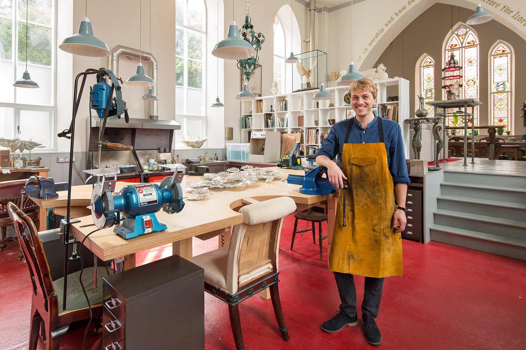 Abandoned stone chapel transformed into Gothic live-work home studio