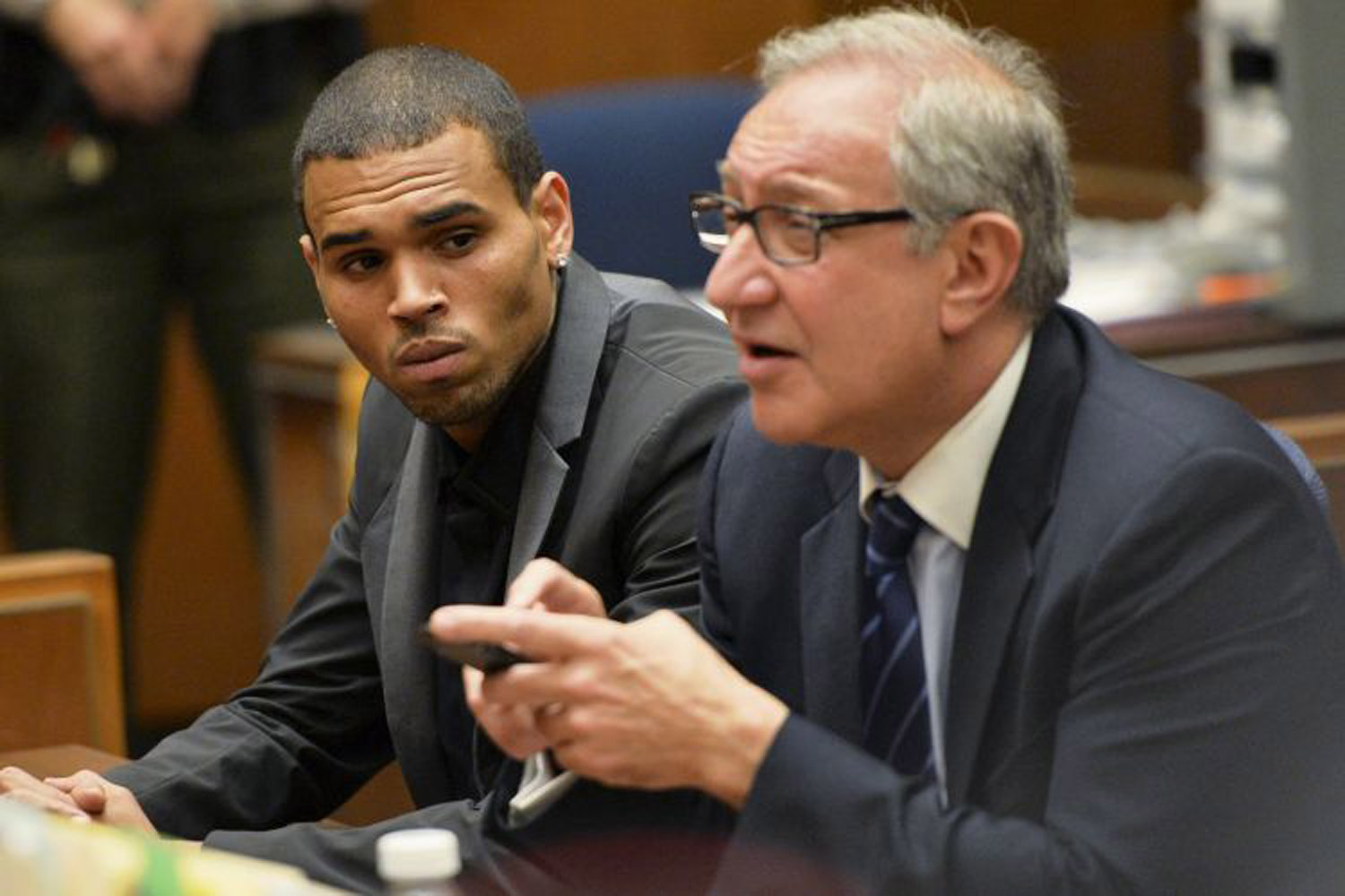 Chris Brown has probation revoked and awaits decision on jail