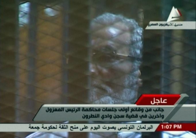 Egypt: Morsi in cage for trial over jail breakouts | London Evening Standard