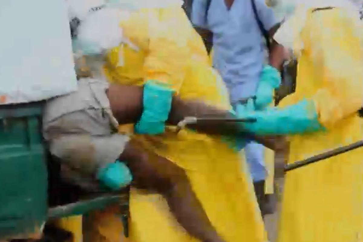 Ebola victim bundled into ambulance by health workers after escaping from hospital | London Evening Standard