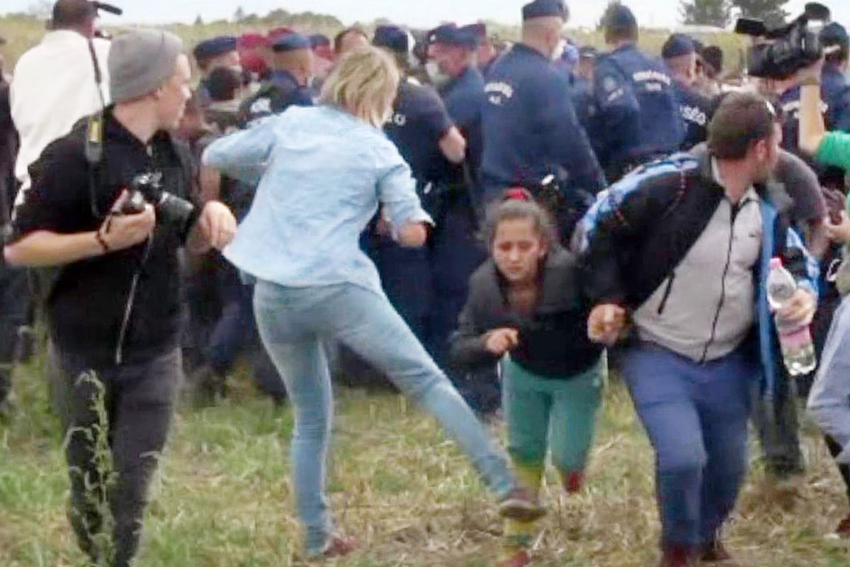 Hungarian camerawoman filmed kicking refugees could face criminal investigation | London Evening Standard