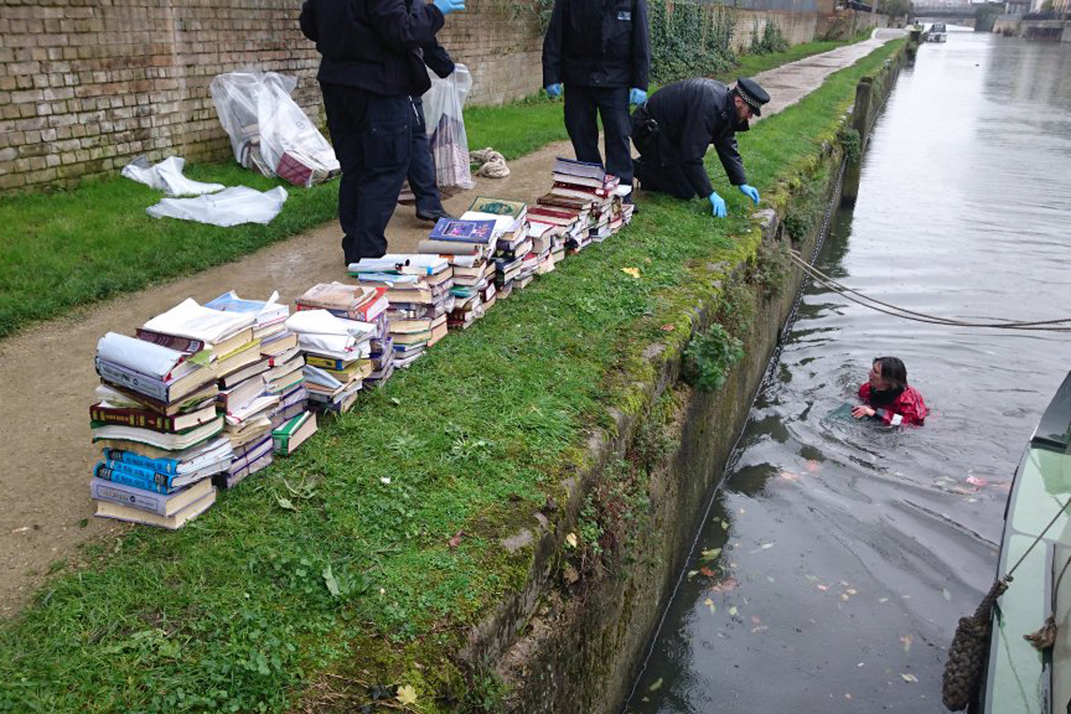 Police 'rescue' 150 Islamic books dumped in east London canal