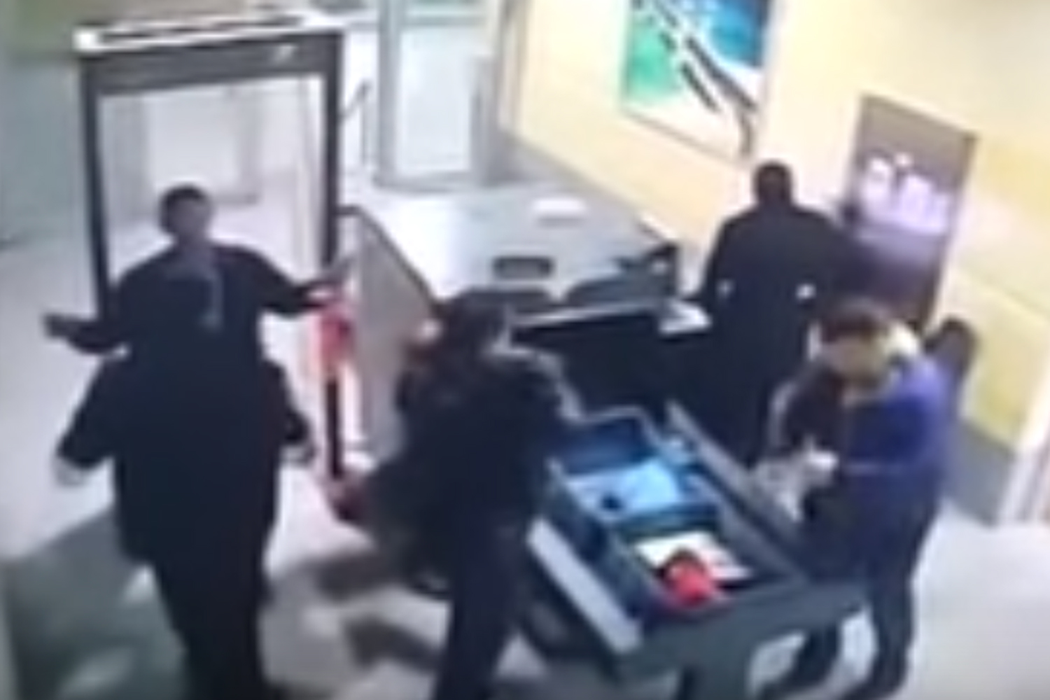 Moment 'hijacker' walks through airport security before six-hour siege