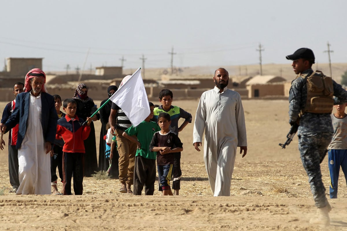 First civilians flee Mosul after battle began to reclaim city from Isis | London Evening Standard