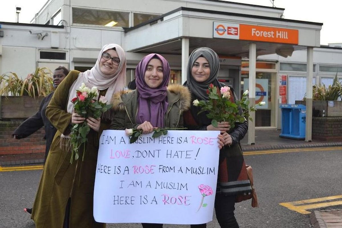 Muslim volunteers hand out roses at Forest Hill station after 'anti-Islamic knife attack' | London Evening Standard