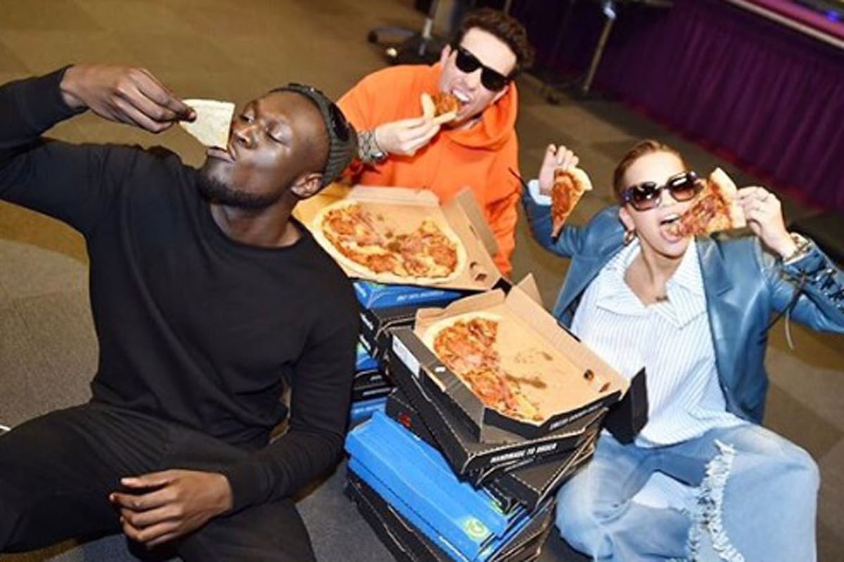 Stormzy surprises Nick Grimshaw and Rita Ora with 20 pizzas during Radio One Breakfast show after Brits | London Evening Standard