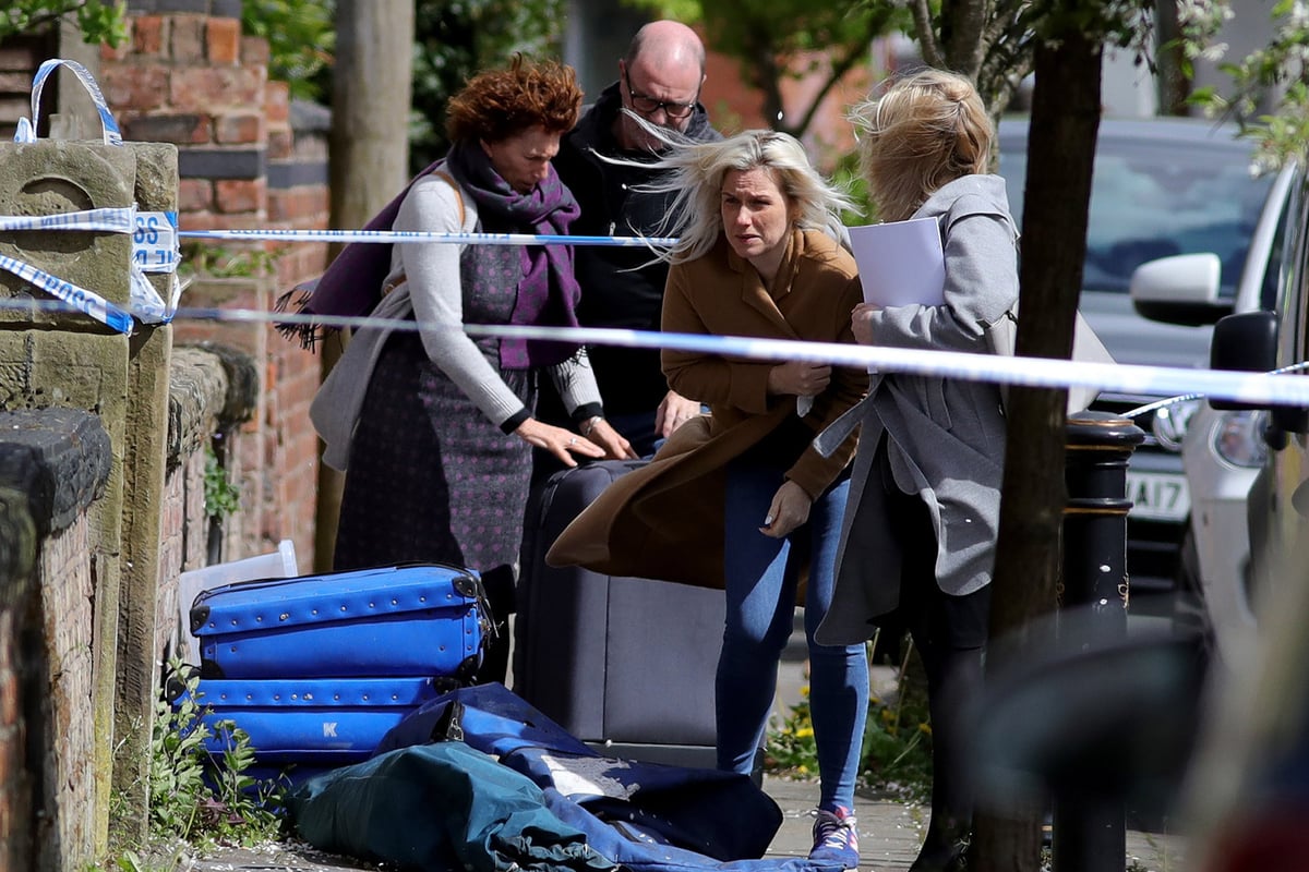 Manchester murder: 'Devastated' wife of former naval officer run down outside home returns to scene of death | London Evening Standard