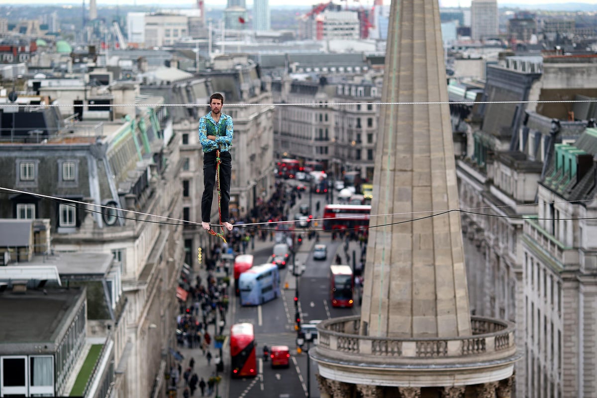 Amazing pictures show adrenaline junkie tackling high wire above BBC studio in central London | London Evening Standard
