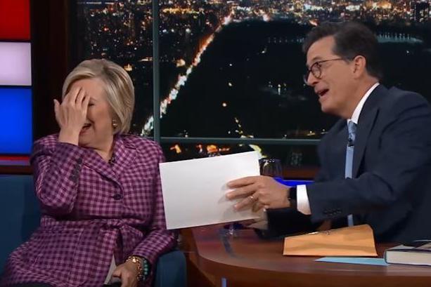 Hillary Clinton handed election consolation prize of naked men picture by Stephen Colbert | London Evening Standard