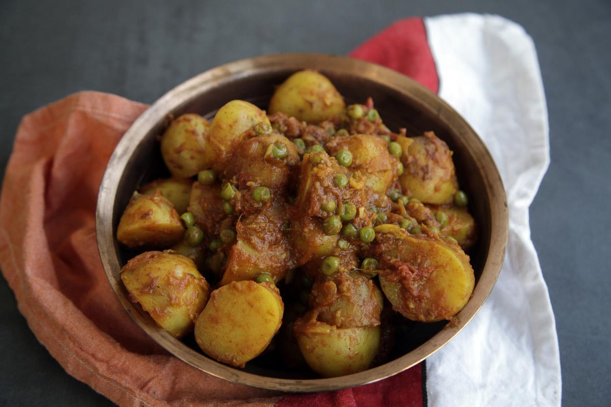 Use your store cupboard ingredients for this easy North Indian potato & pea curry | London Evening Standard