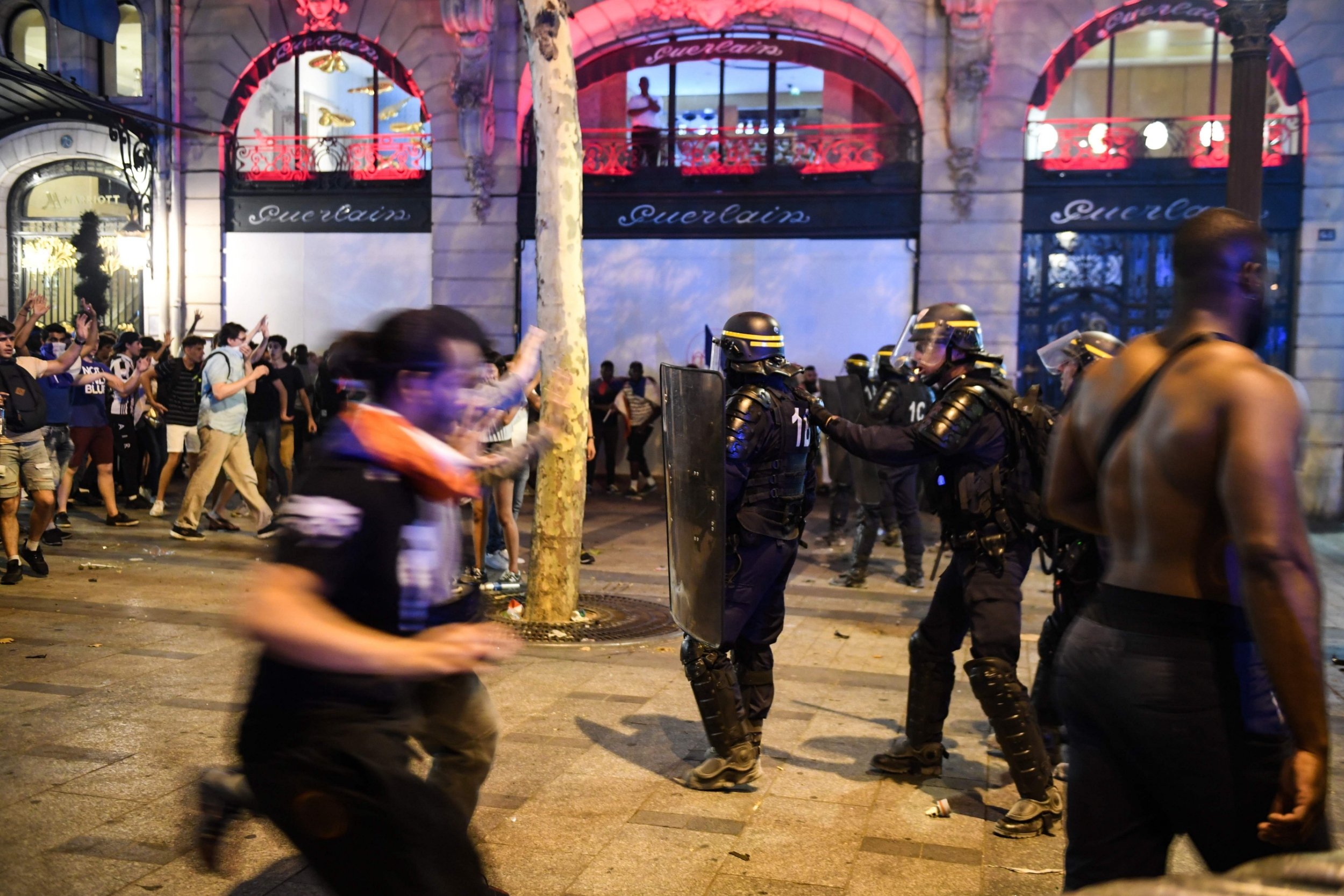 Two football fans killed as police clash with World Cup fans in Paris
