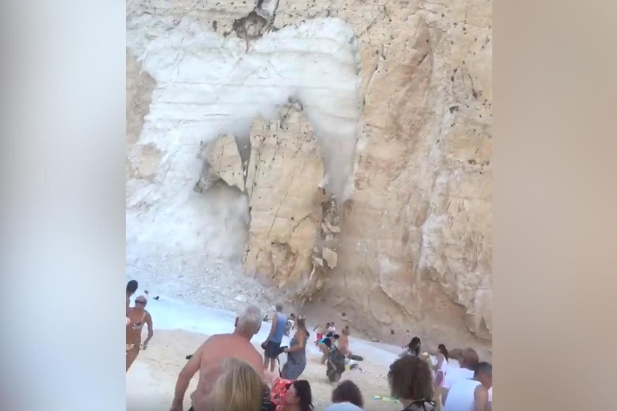 Zante shipwreck beach landslide: Terrifying moment tons of rock falls from cliff in tourist hotspot on Greek island | London Evening Standard