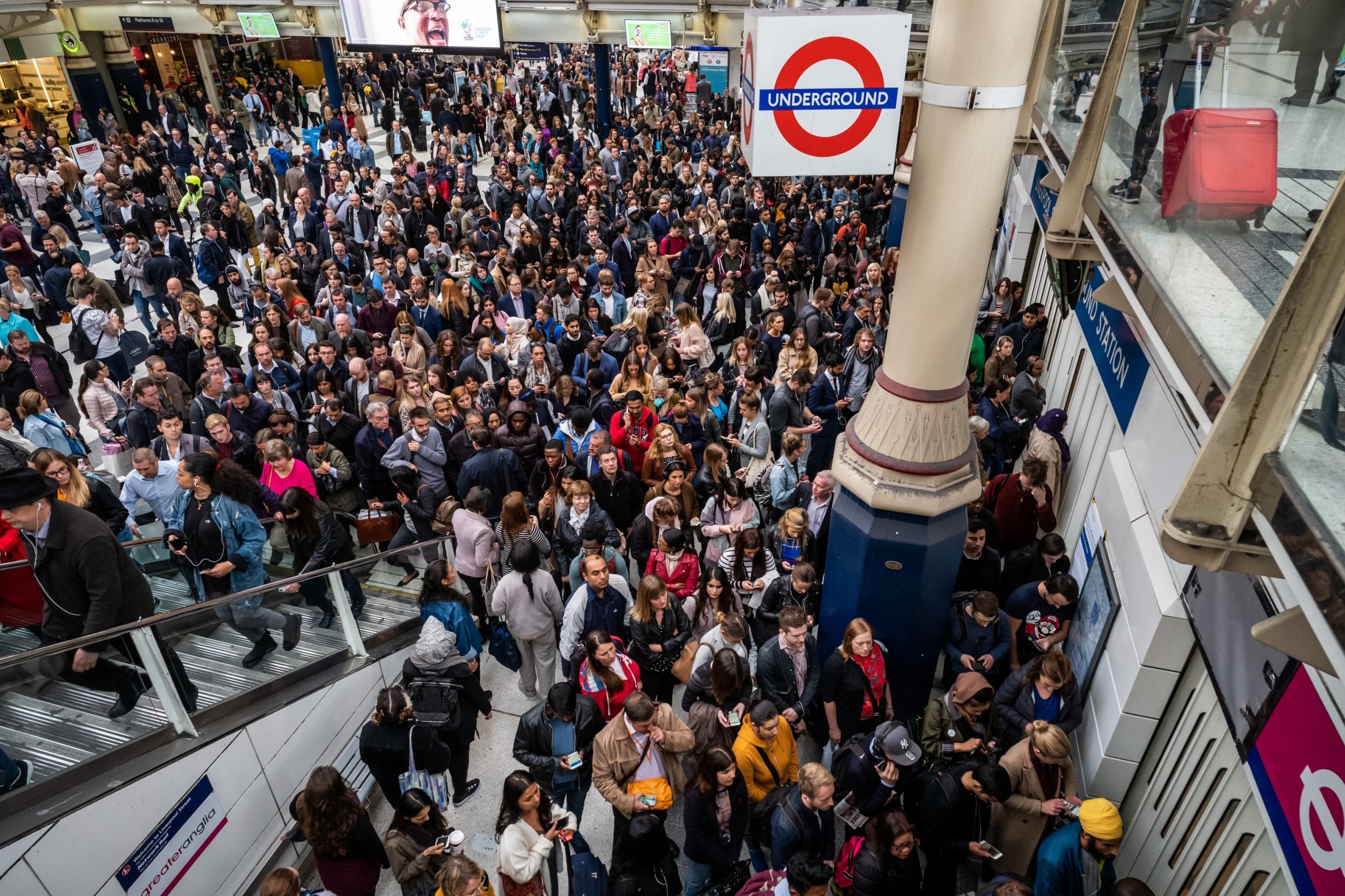 Londoners caught in rush hour chaos in Tube and train strikes