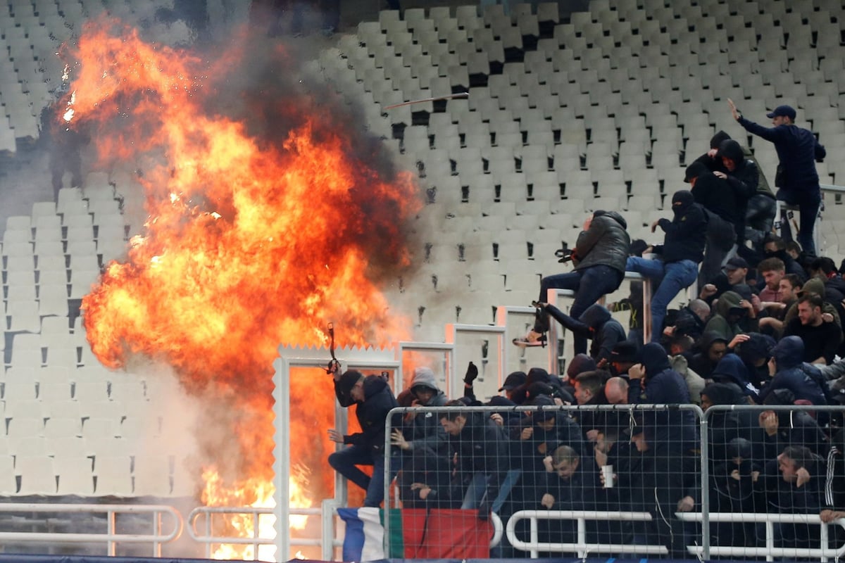 AEK Athens v Ajax fan violence: Supporters left bloodied in stadium clashes during Champions League match | London Evening Standard