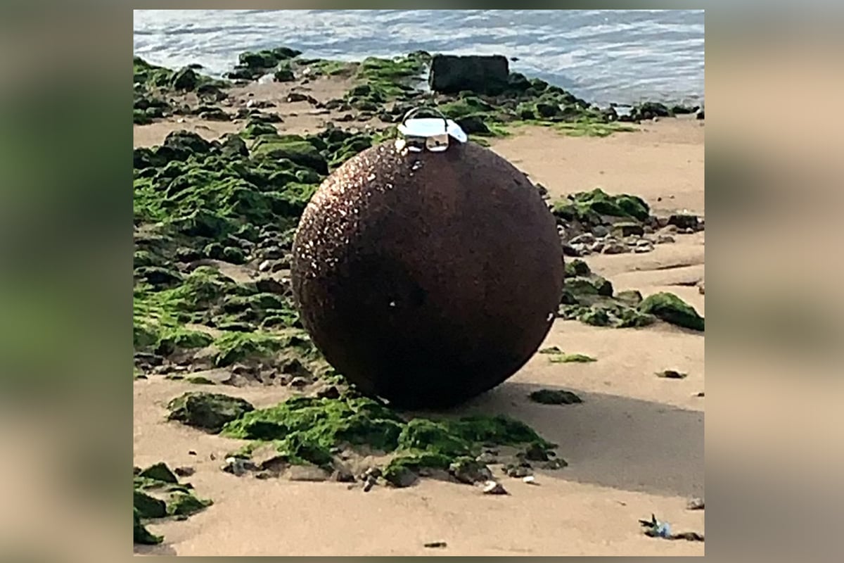 Suspected unexploded bomb found on bank of Thames turns out to be giant Christmas bauble | London Evening Standard