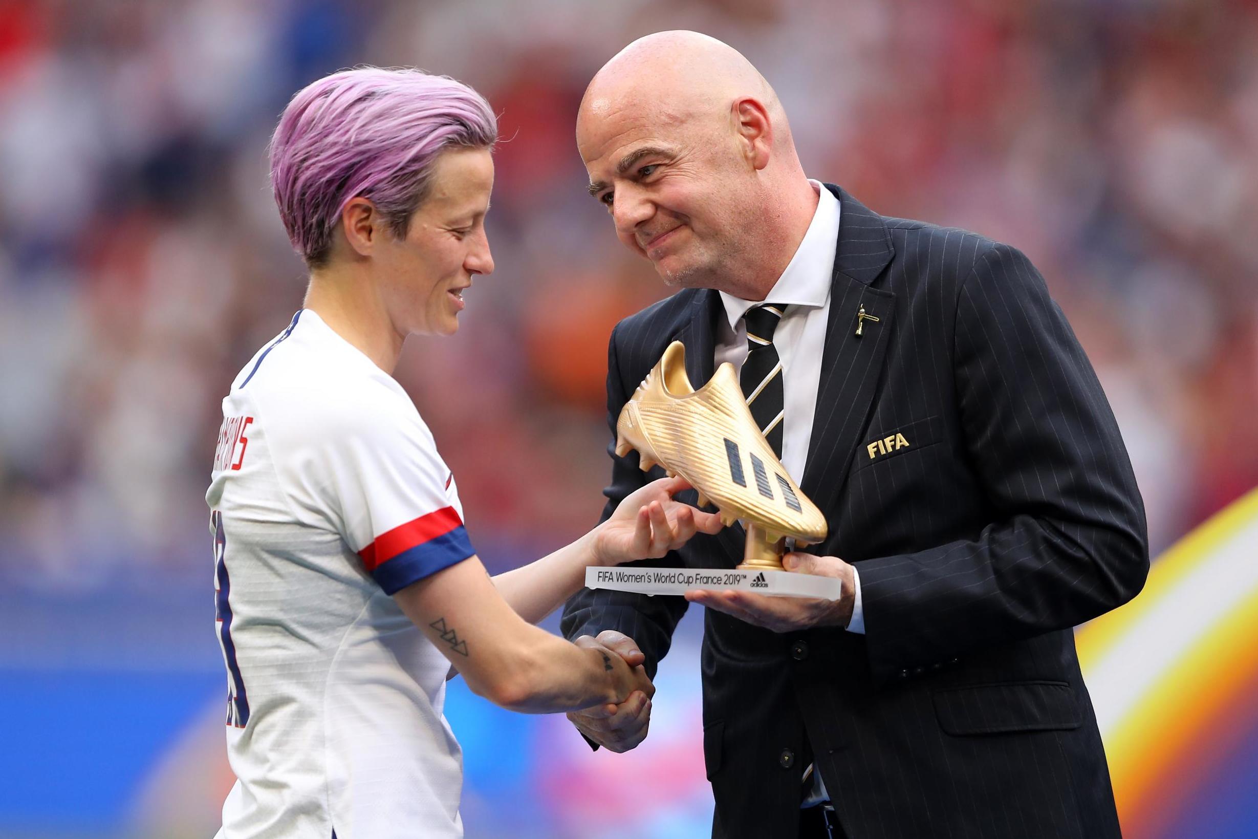 Rapinoe wants progress on pay talks as Infantino earns World Cup boos