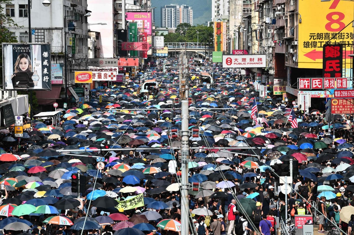 Hong Kong police arrest at least 14 high profile activists after mass pro-democracy protests last year | London Evening Standard