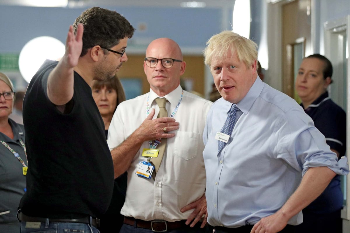 Boris Johnson confronted by furious parent of 'gravely ill' child over NHS waiting times during hospital visit | London Evening Standard