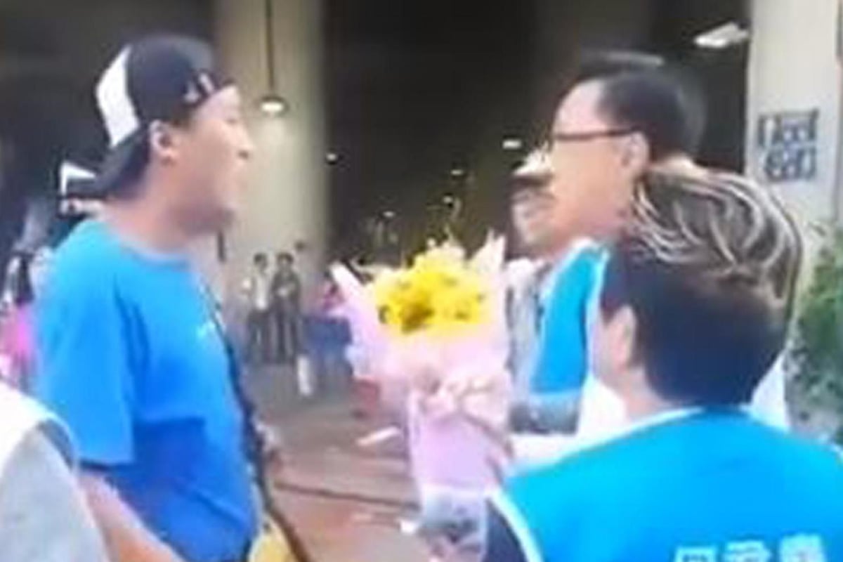 Shocking moment man stabs pro-Beijing politician in Hong Kong after handing him flowers | London Evening Standard