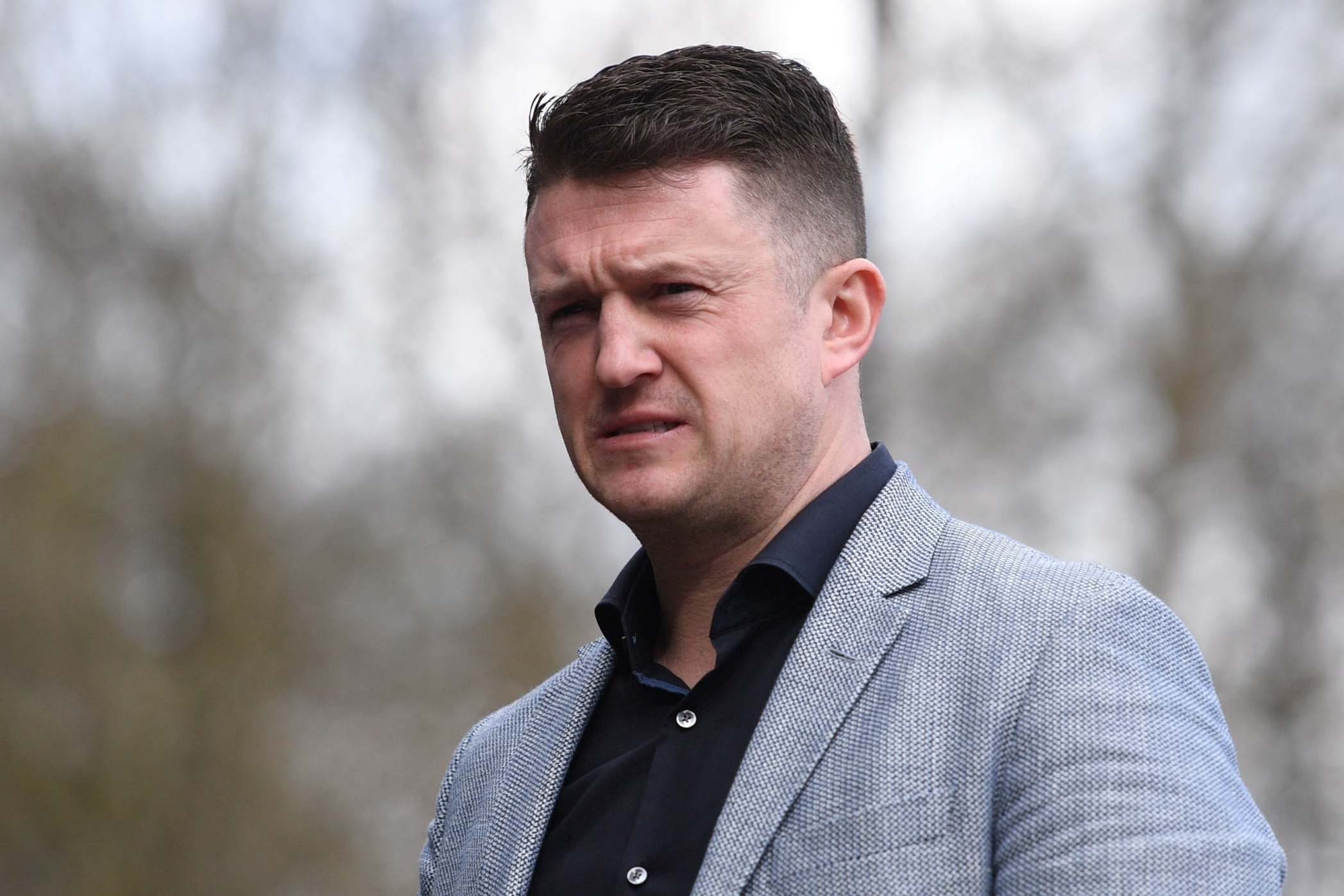 Man to face trial over YouTube video death threats to Tommy Robinson