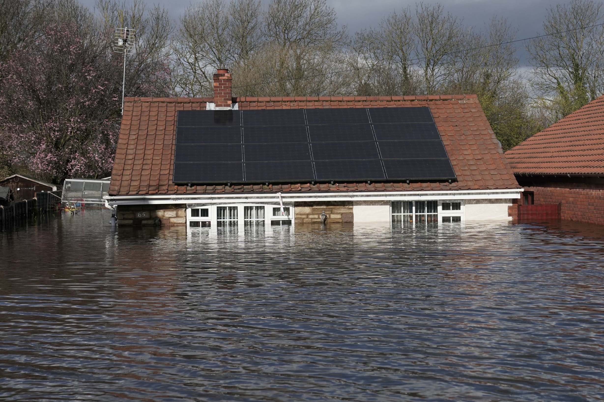 Homes almost completely submerged in the wake of Storm Jorge