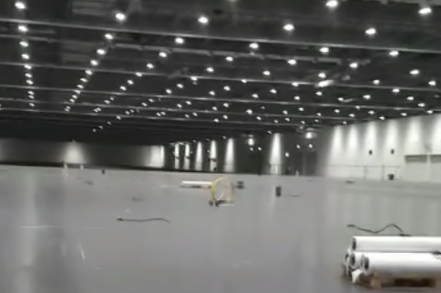 Footage from Excel Centre shows huge space for beds as it's converted into coronavirus hospital | London Evening Standard
