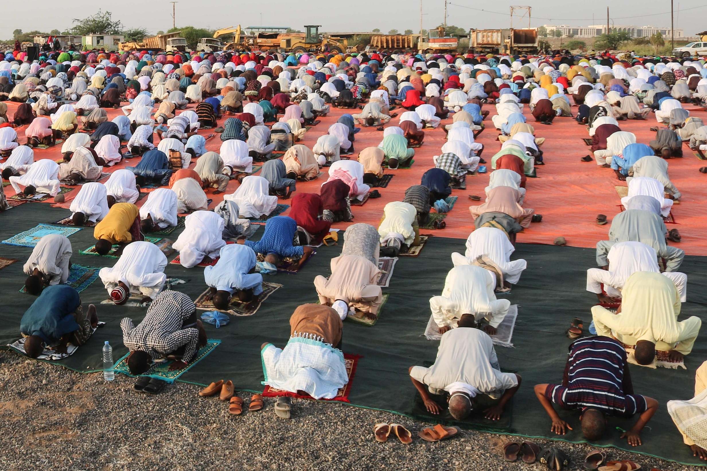 Muslims around world celebrate Eid amid curfews and virus fears