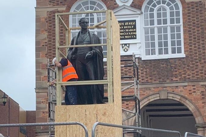 MP slams 'agitators who can’t get their history right' as statue of Robert Peel boarded up to protect it | London Evening Standard