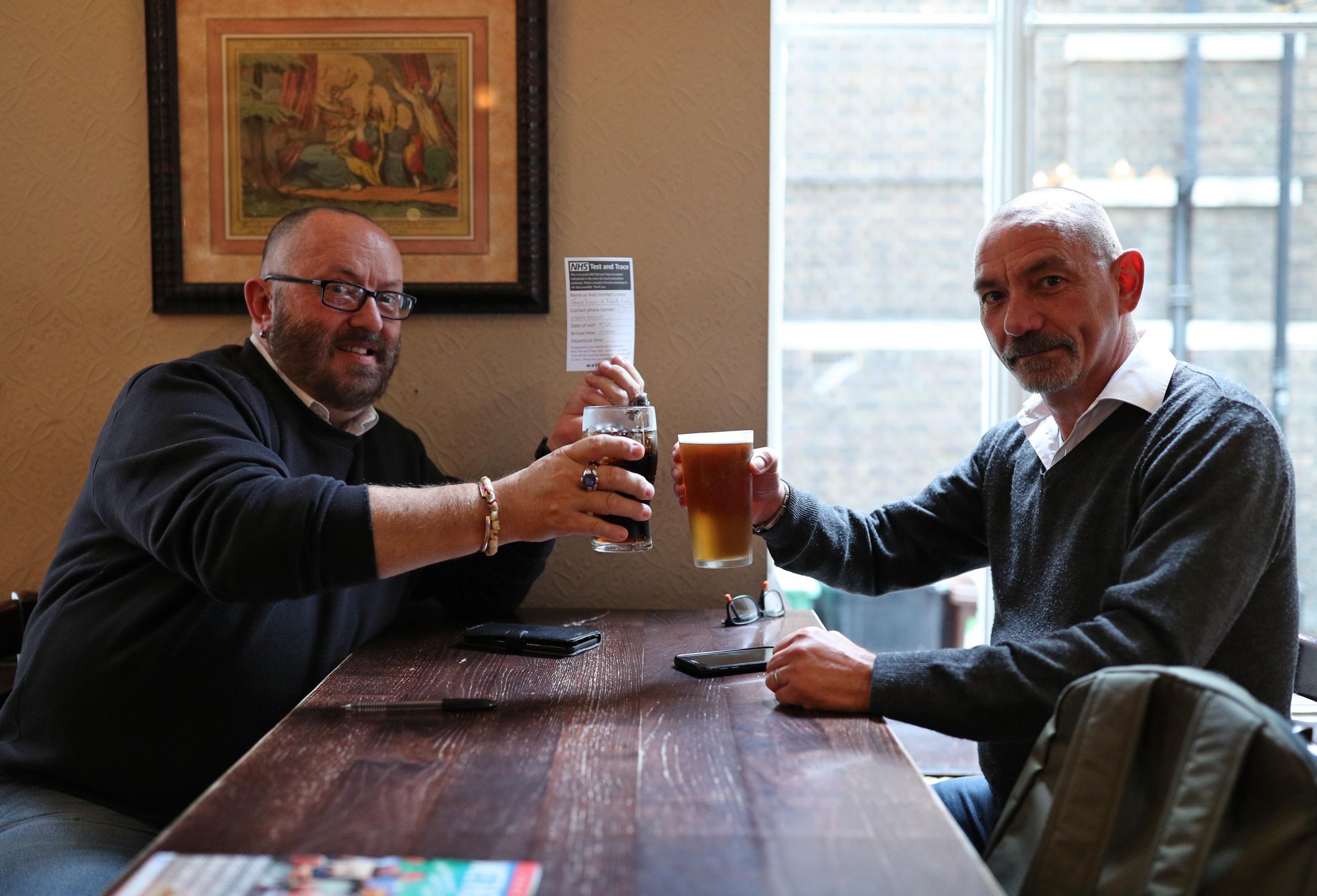'Like winning the Premier League': Drinkers hail pubs reopening