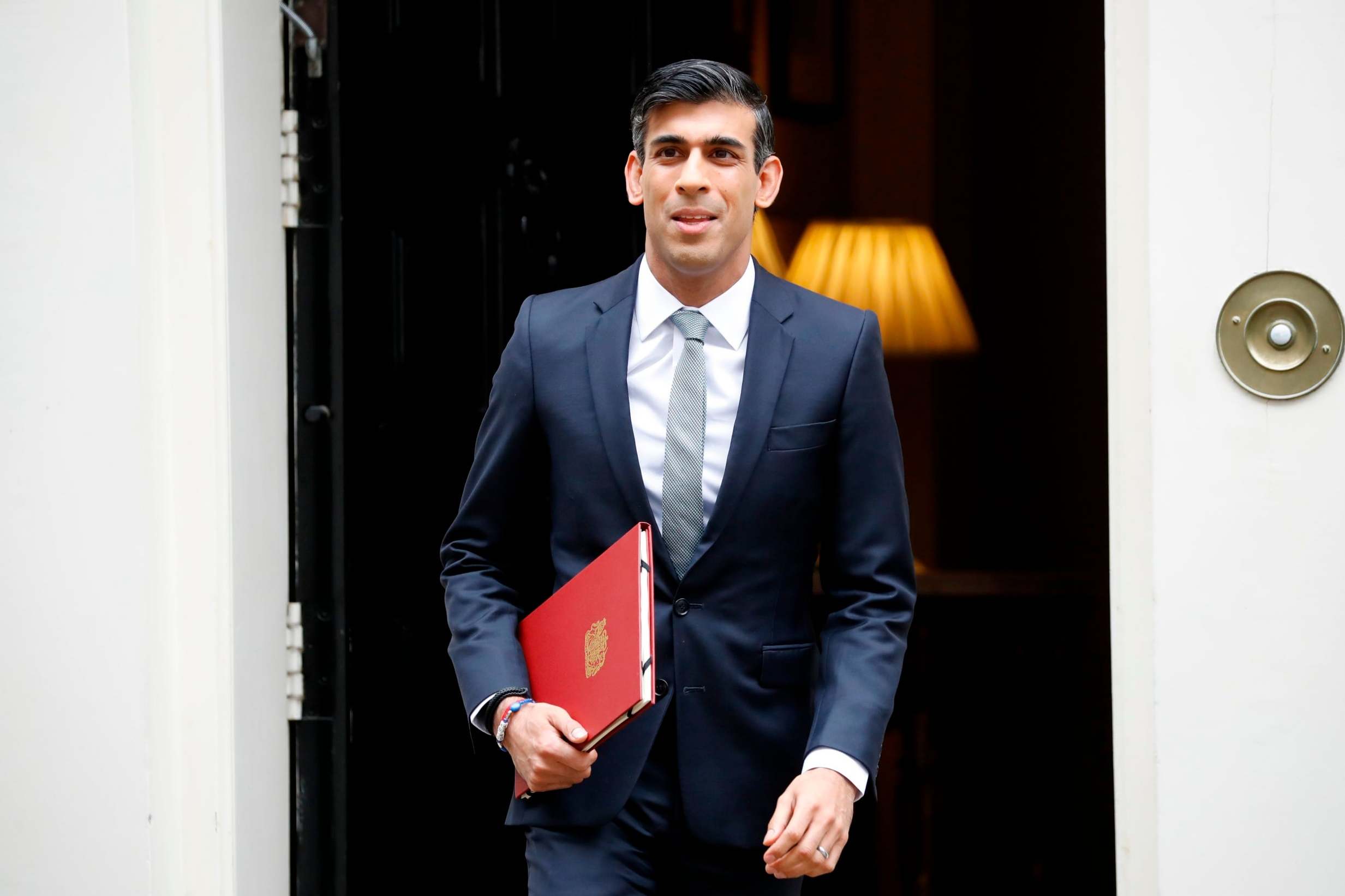 Sunak gives Britons half-price meals and slashes VAT to boost economy