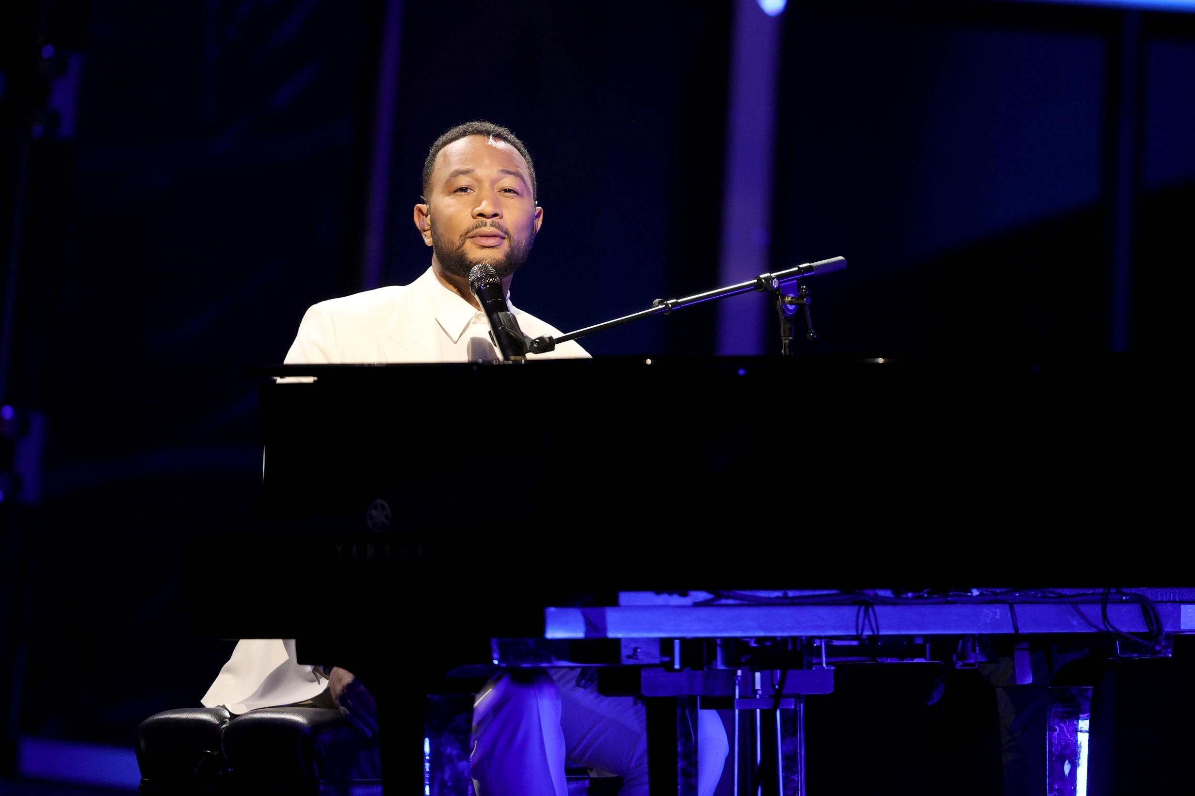 John Legend dedicates awards show performance to Chrissy Teigen