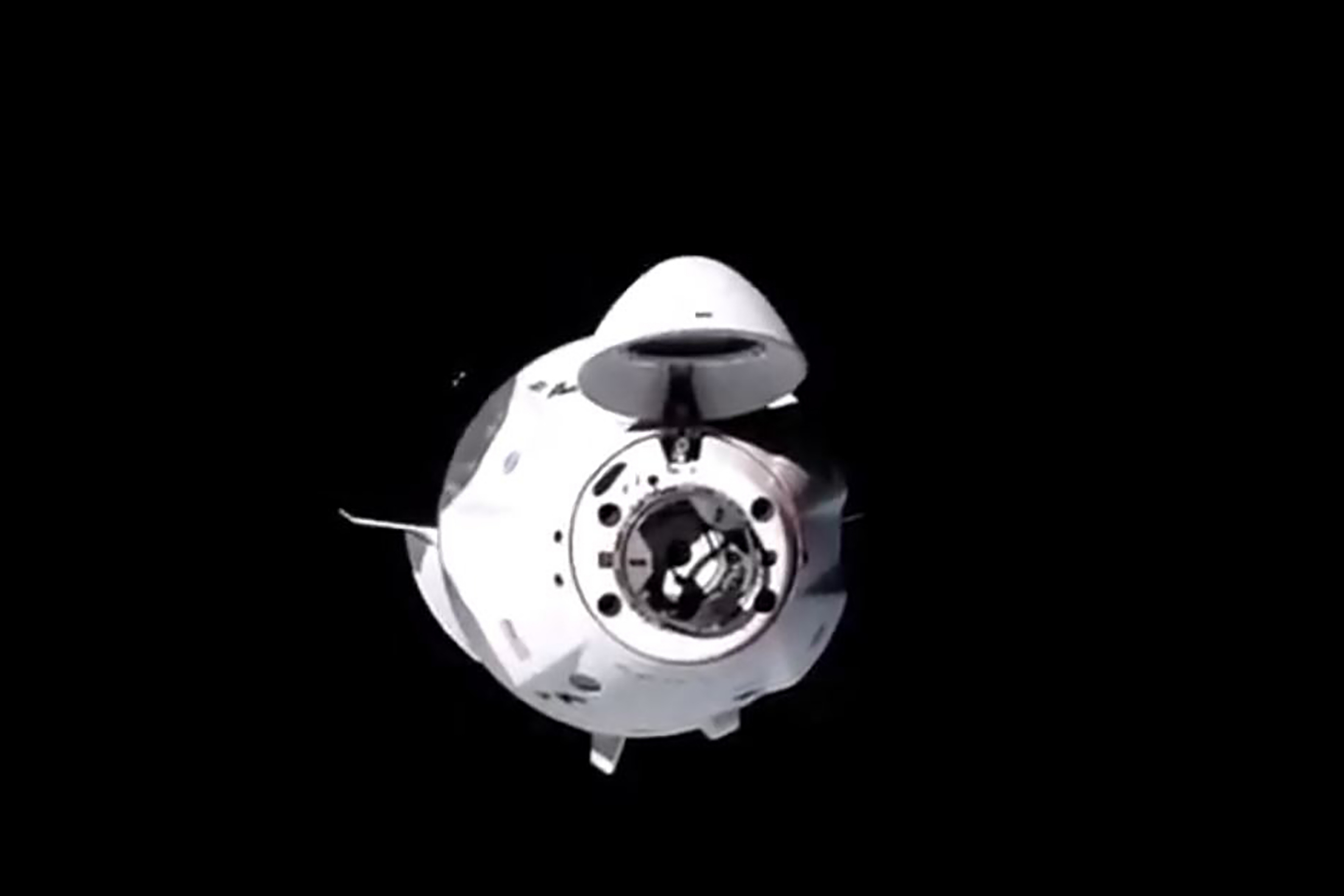 SpaceX Dragon capsule docks with International Space Station