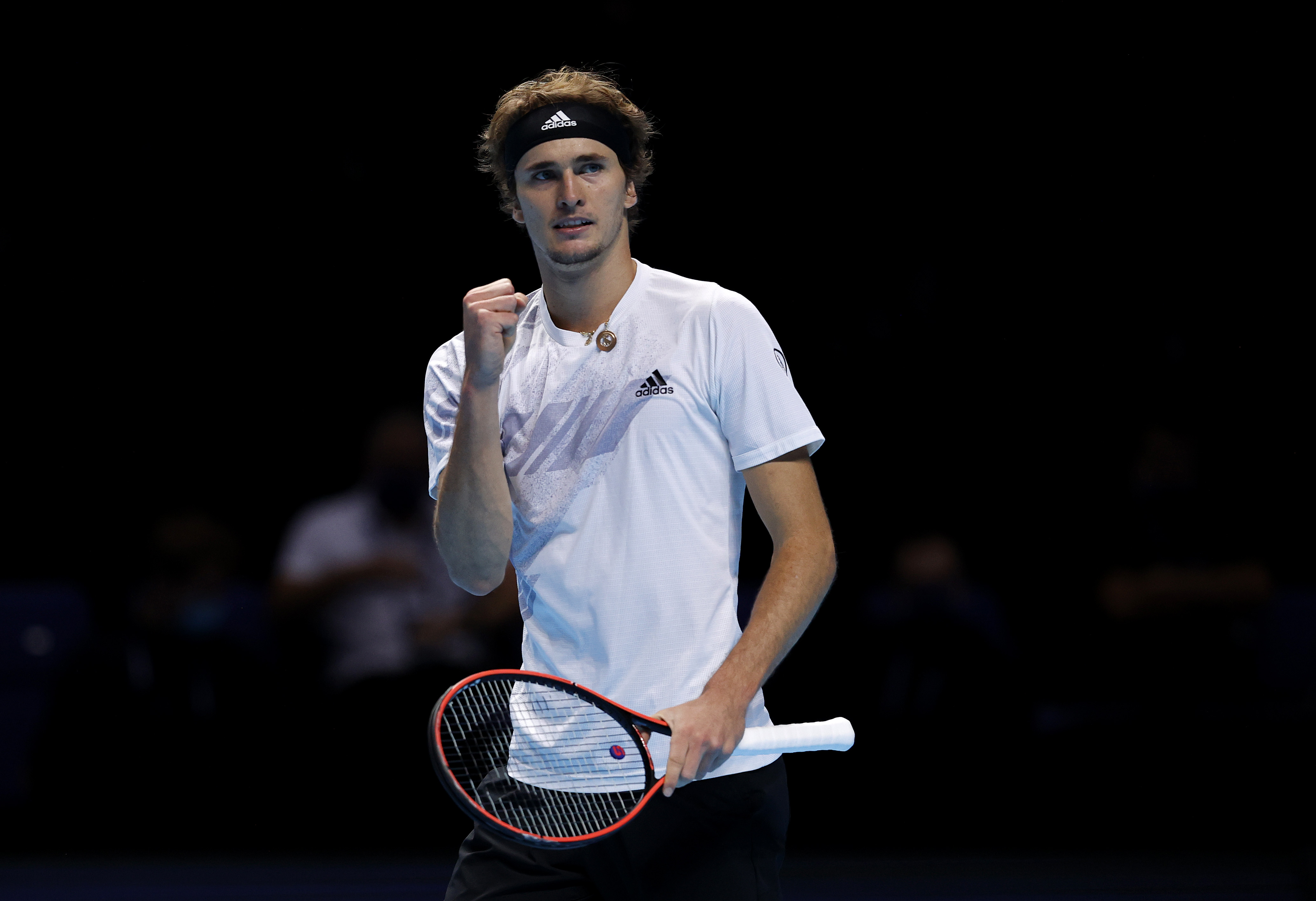 Zverev holds nerve to fend off Schwartzman at ATP Finals