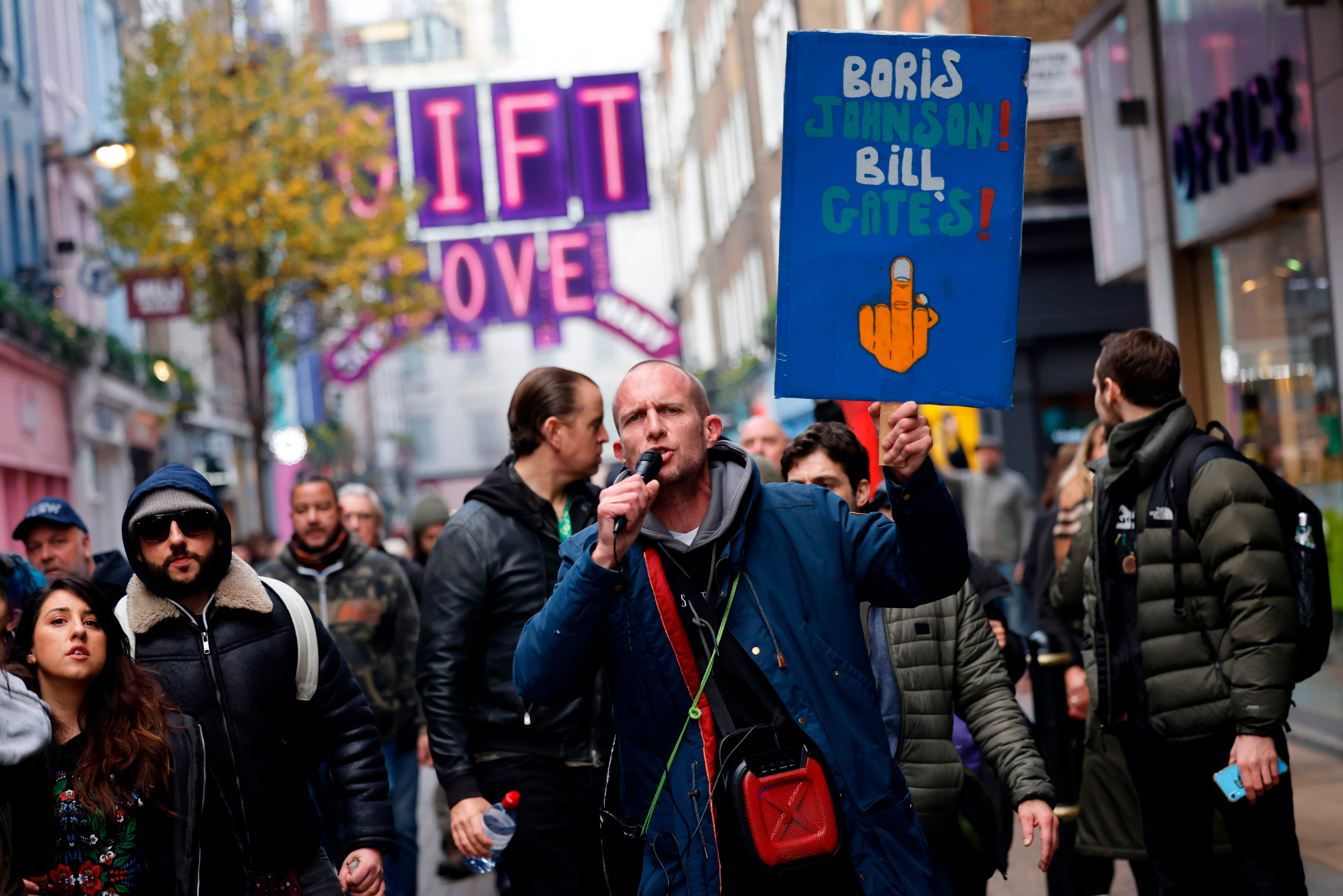 Lockdown protests sweep London as UK Covid death toll rises by 479