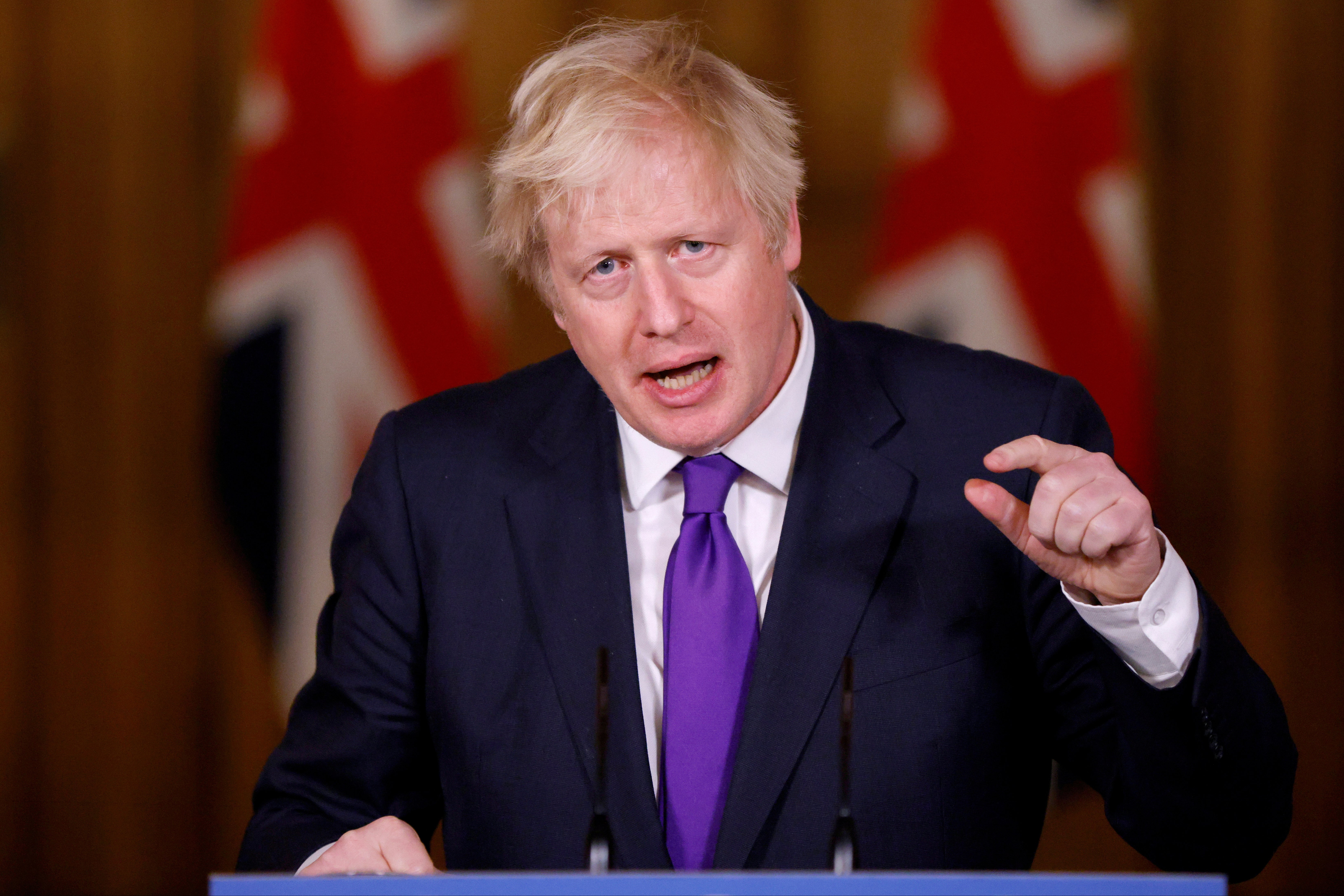 FILE PHOTO: Britain's PM Johnson attends a news conference in London