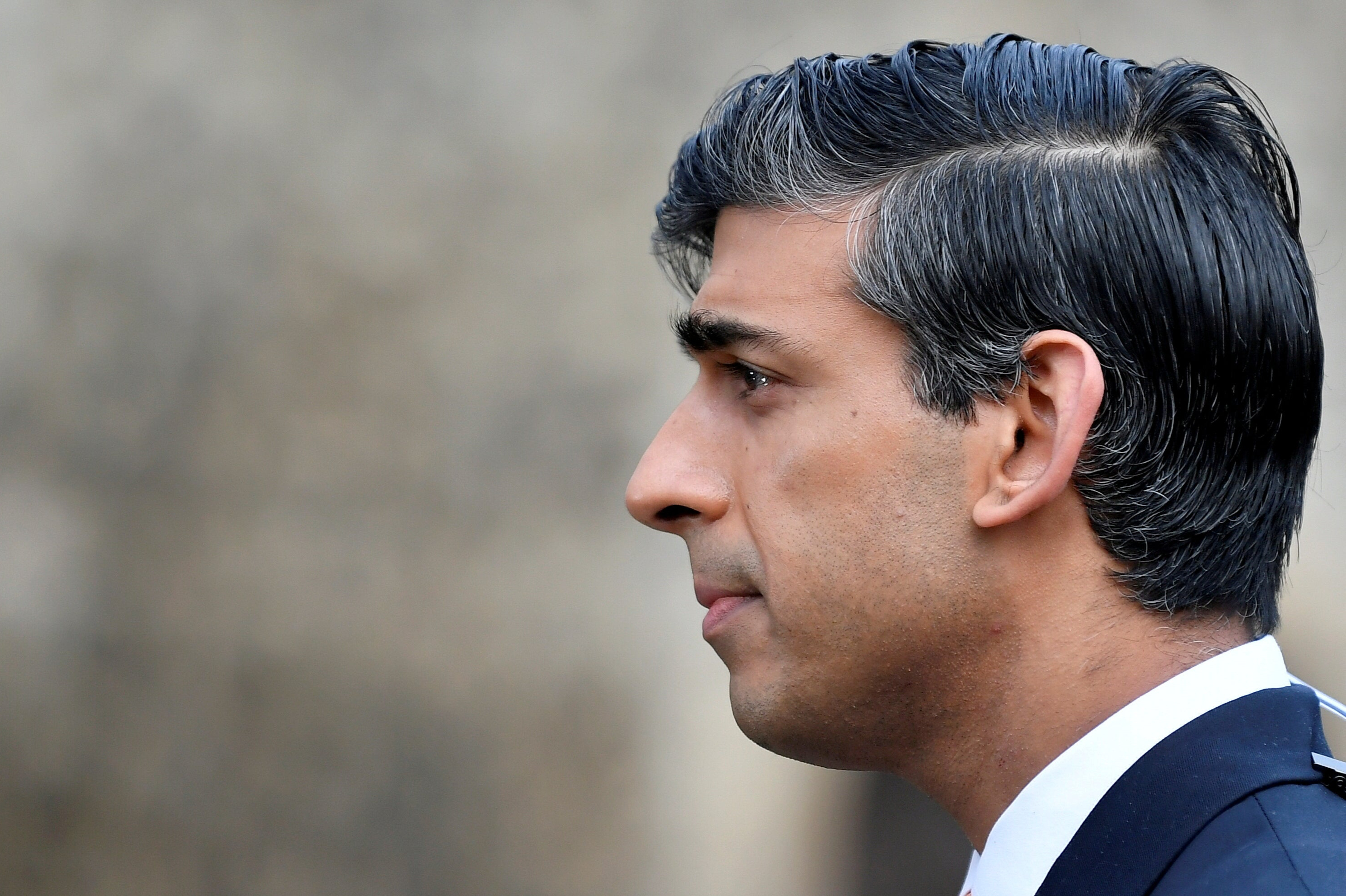 FILE PHOTO: Britain's Chancellor of the Exchequer Rishi Sunak takes part in an outside broadcast interview, in London