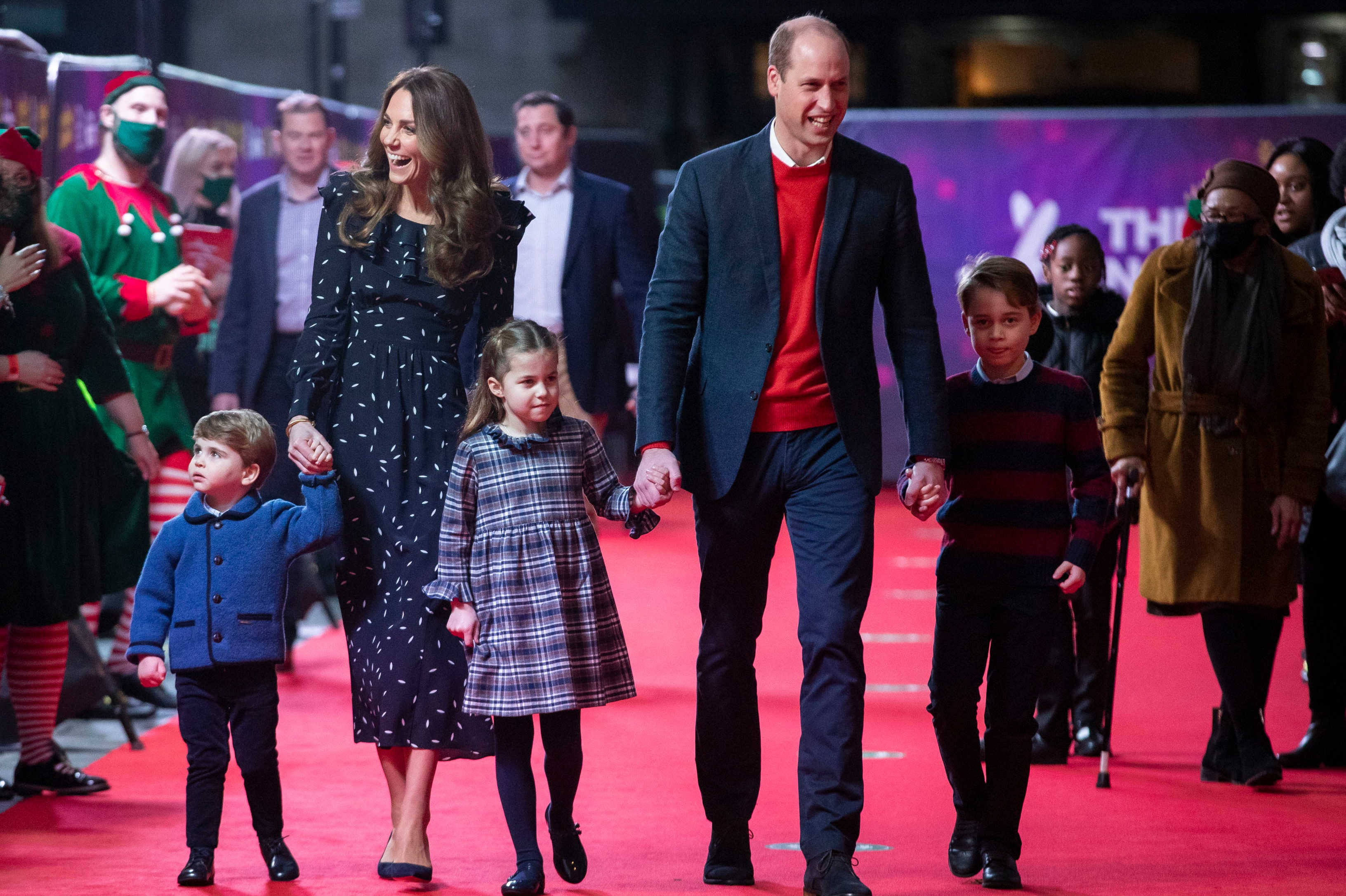 Cambridges enjoy special panto in rare public outing as family