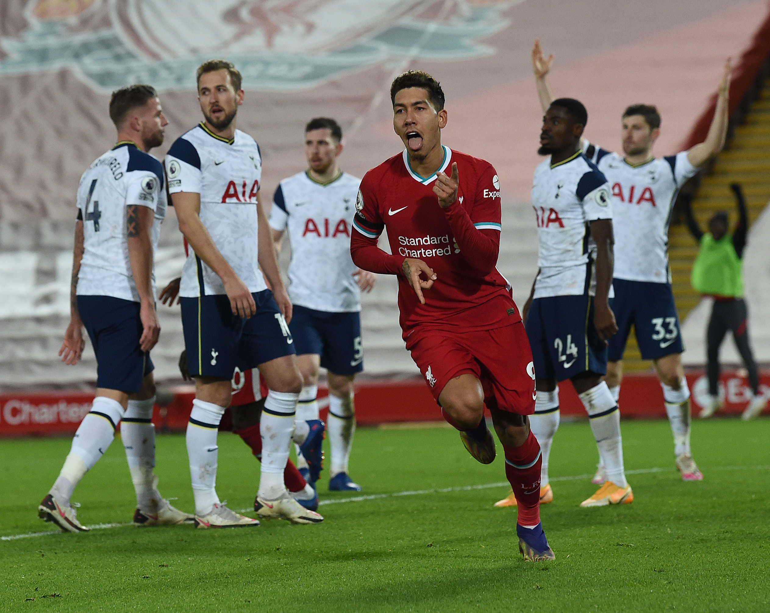 Liverpool 2-1 Tottenham: Late Firmino header sends chamions top