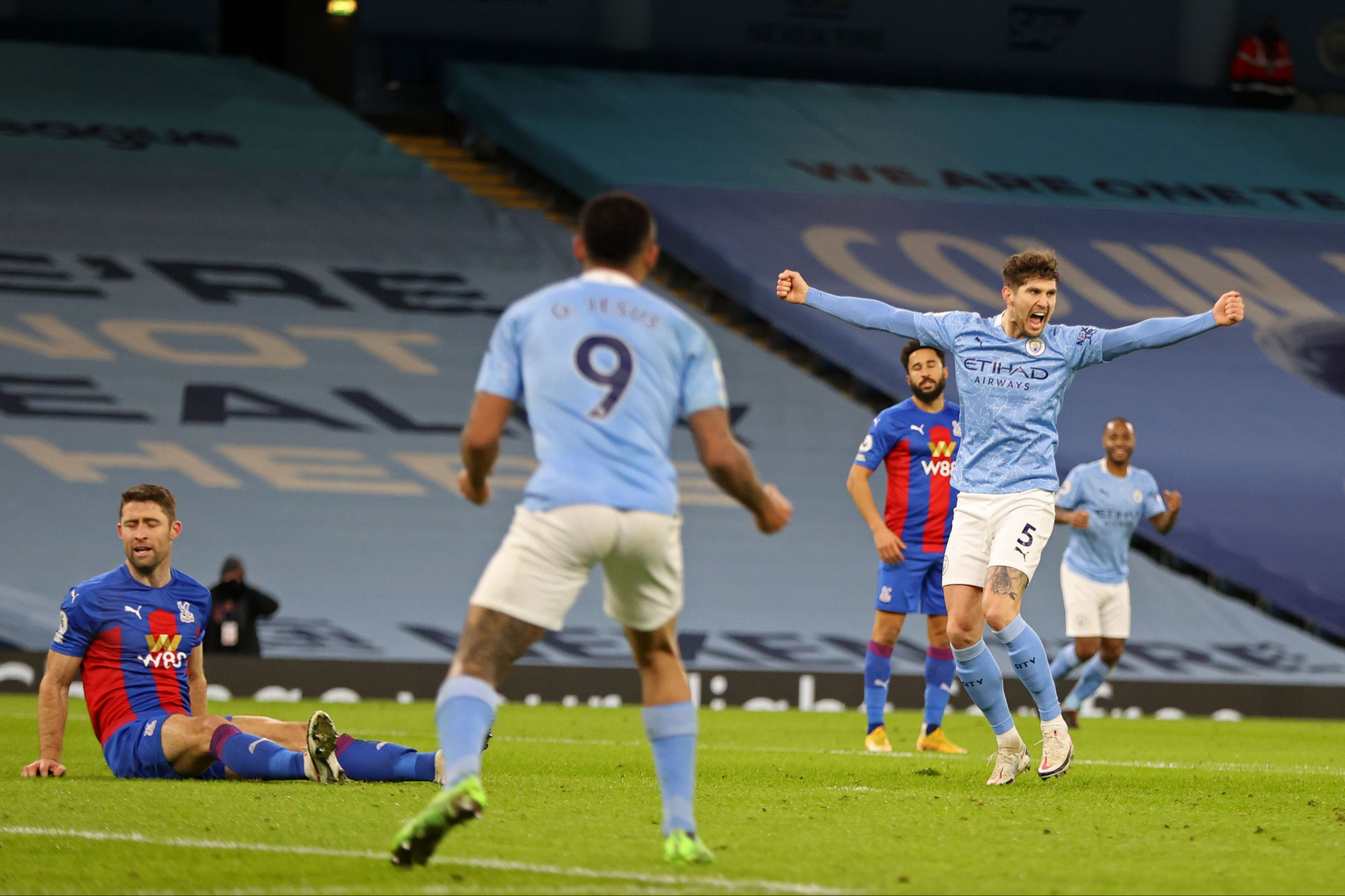 Man City boost title hopes as John Stones double downs Palace