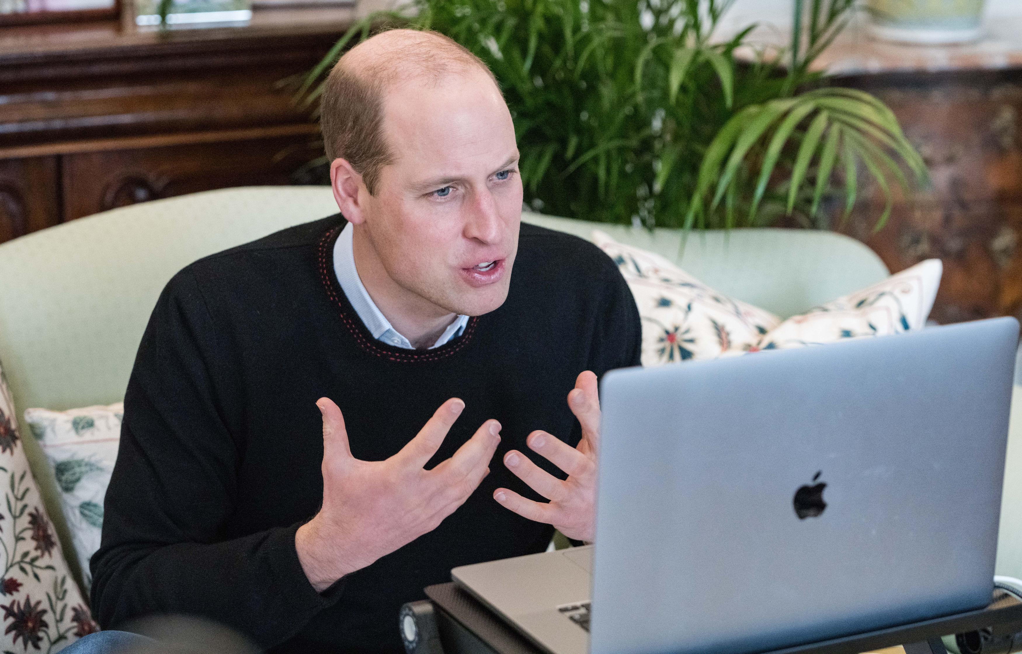 Prince William speaks with members of the Young Champions of the Earth initiative