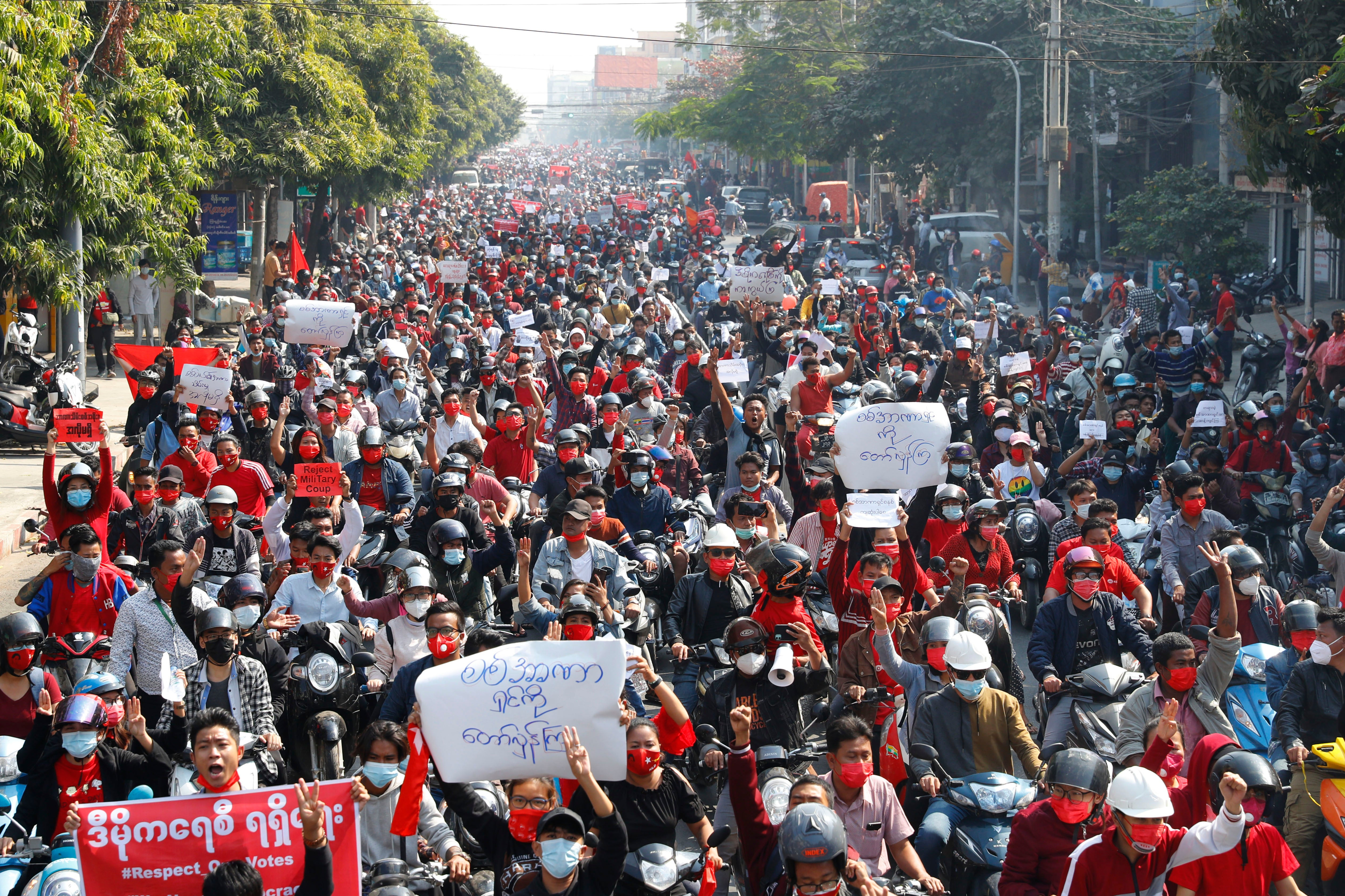 Tens of thousands rally in Myanmar to denounce coup and demand the release of elected leader Aung San Suu Kyi