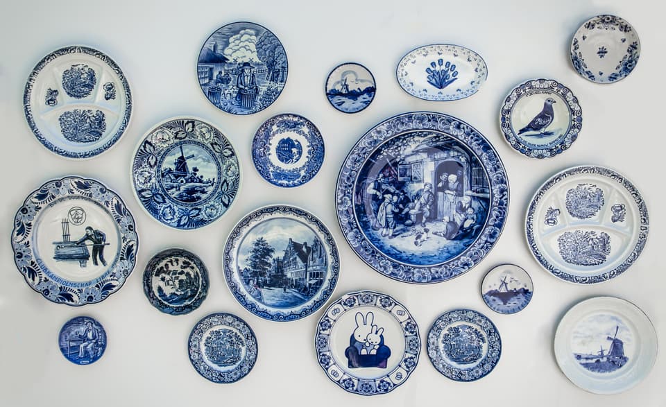 Keukenhof. Holland MAY 9, 2016. Decorative plates from Holland. Dutch souvenir on the wall.